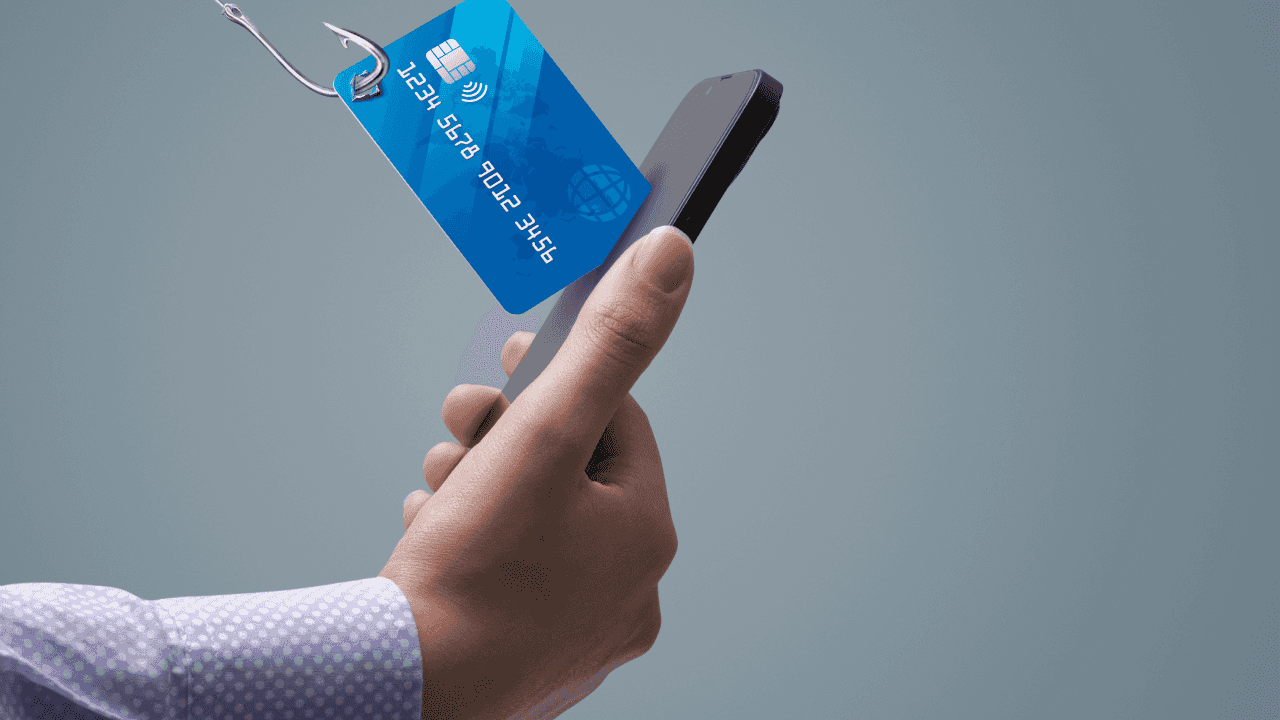 carta di credito che esce da uno smartphone